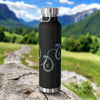 Black insulated water bottle with paisley peace design