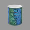 A white ceramic mug featuring an abstract art print with swirling blue and green patterns around the word Awakening written in black cursive script.