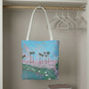 Tote bag with a print of palm tree and sunset painting with lily pads