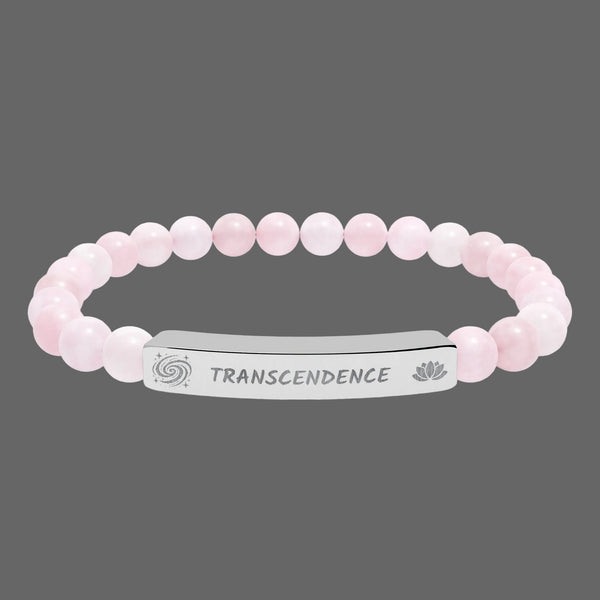 Beaded bracelet with a silver tag saying Transcendence with galaxy and lotus symbols