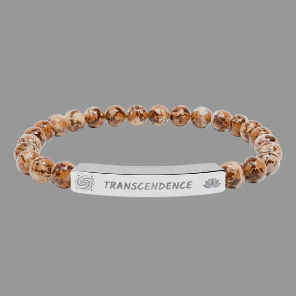 Beaded bracelet with a silver tag saying Transcendence with galaxy and lotus symbols