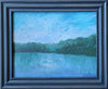 Framed painting of a landscape with a blue sky and green trees.