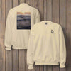 Sand color sweatshirt with poem on ocean sunset photo on back and logo on front